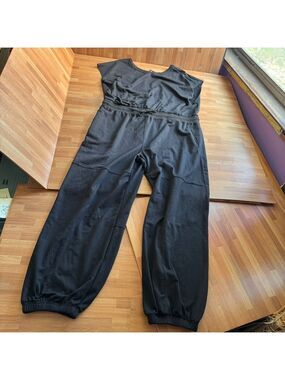 Black one piece, sleeveless jumpsuit size XL elastic ankle